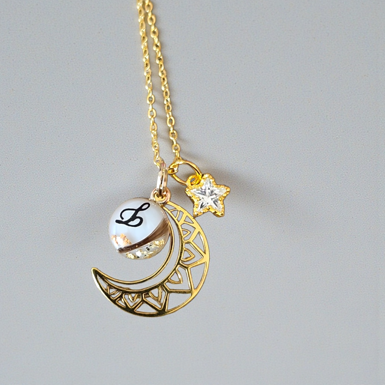 Pendentif pierre de lune rose orangée Inde A (pierre roulée)| La Boîte Pendentif pierre de lune rose orangée Inde A (pierre roulée)| La Boîte